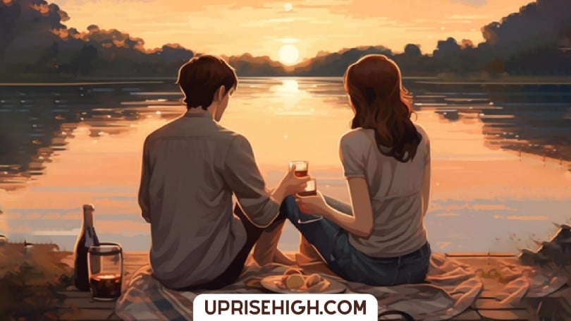 A girl and a guy on a date sitting besides a river.